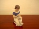 Bing & Grøndahl 
has produced 
this cute 
figurine of a 
girl and a dog. 

Decoration 
number 2316 ...
