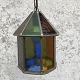 Lamp in lead framed glass. Yellow/green/blue shades. Height approx. 26 cm.Cracks in a single ...