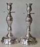 A pair of silver-plated rococo candelsticks, 20th century Denmark. Stamped Prima Silver. FS, ...