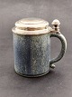 Arne Bang 
ceramic mug 
with silver lid 
H. 14 cm. blue 
mottled glaze 
item no. 510152