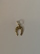Horse shoe in 
14 karat gold
Stamped Bh 585
Height 18.07 
mm approx
Thickness 0.80 
mm ...