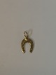 Horse shoe in 
14 karat gold
Stamped 585
Height 15.91 
mm approx
Thickness 1.40 
mm approx
Nice ...