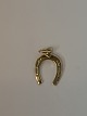 Horse shoe in 
14 karat gold
Stamped EH 585
Height 19.87 
mm approx
Thickness 0.89 
mm ...