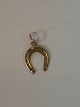 Horse shoe in 
14 karat gold
Stamped 585
Height 17.82 
mm approx
Thickness 0.80 
mm approx
Nice ...