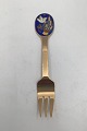 Anton Michelsen 
Christmas 
Pastry Fork 
1985 Gilded 
Sterling Silver 
with enamel
The textile 
...