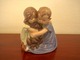 Royal 
Copenhagen has 
produced this 
large and 
gorgeous 
figurine of two 
children 
holding their 
...