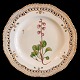 Royal 
Copenhagen, 
Flora Danica 
porcelain; 
Dinner plate 
#3553 with 
pierced border. 
Decoration: ...