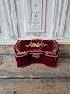 French Art 
Nouveau 
jewelery box 
covered with 
purple velvet.
Measures 19.5 
x 27.5 cm. 
Height 7.5 cm.