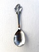 Cohr Silverware 
Factory. 
Serving spoon 
with handle in 
three-towered 
silver (830S) 
from 1944. ...