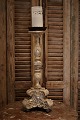 Old French wooden candlestick with fine carvings, remnants of old silver coating and has a very ...