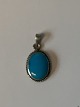 Silver pendant with turquoiseStamped 925Height 20.94 mm approxThe item has been checked by ...