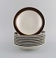 Hertha Bengtson (1917-1993) for Rörstrand. Nine Koka deep plates in glazed stoneware. ...