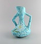 Yvan Borty for Vallauris. Modernist vase in glazed stoneware. Beautiful glaze in 
turquoise shades and hand-painted flowers. French design, mid 20th century.
