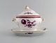 Early and rare 
Bing & Grøndahl 
lidded tureen 
in hand-painted 
porcelain with 
purple flowers 
and ...