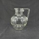Height 17 cm.Fine mouth-blown jug from Holmegaard Glasværk.It appears in the glass ...