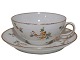 Royal 
Copenhagen 
small chocolate 
cup with 
matching 
saucer. It is 
decorated with 
flowers - also 
...