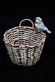 Old Viennese bronze figure in the shape of a small wicker basket with a small bird sitting on ...