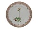 Royal 
Copenhagen 
Flora Danica, 
side plate with 
yellow flower.
Decoration 
number ...
