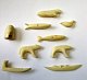 Collection of small Greenlandic bone figures to a chain, 20th century. A total of 9 pieces. Cuts ...