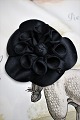 Original Vintage Chanel flower brooch in thick black silk fabric.Dia:8cm.