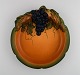 Ipsen's, Denmark. Art nouveau dish in hand-painted ceramics with grape vine and foliage. ...
