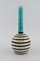 Swedish 
ceramicist. 
Unique vase in 
glazed 
stoneware. 
Colorful 
decoration. 
Dated 1959.
Measures: ...