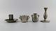 Just Andersen (1884-1943), Denmark. Art deco tin candlestick, match box holder and two vases. ...