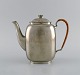 Just Andersen (1884-1943), Denmark. Art deco tin coffee pot with wicker handle. 1940s. Model ...
