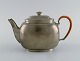 Just Andersen (1884-1943), Denmark. Art deco tin teapot with wicker handle. 1940s. Model number ...