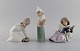 Lladro, Spain. Three porcelain figurines. 1970/80s.Largest measures: 15 x 14 cm.In excellent ...