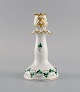 Herend 
candlestick in 
hand-painted 
porcelain with 
gold 
decoration. Mid 
20th century.
Measures: ...
