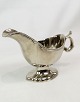 Gravy pot in silver stain with a beautiful pearl edge from around the 1930s.H:12 W:20 D:9.5