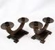 A pair of bronzed brass candlesticks from the 1930s. Stands with a very fine patina.H: 8.5 W: ...