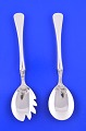 "Patricia" 
silver cutlery, 
danish 830 
silver. 
Salad spoon 
and salad fork, 
length 21.3cm. 
8 3/8 ...