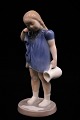 Bing & Grondahl porcelain figurine of a little girl with spilled milk. H:17.5 cm. Decoration ...