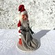 Santa with 
rubber head and 
gift bag, 16cm 
high, 9cm in 
diameter *Nice 
patinated 
condition*