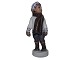 Dahl Jensen figurine, boy in winter clothes.The factory mark tells, that this was produced ...