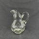 Height 13 cm.Beautiful clear cream jug from Holmegaard.The jug is seen in the ...
