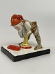 Antique letter weight in the form of a figure with a goblin / gnome putting a seal on a letter. ...