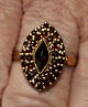 Gilt silver 
ring with 
garnets, 20th 
century. 
Stamped. Size: 
56/57.
Perfect 
condition!