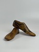 Pair of antique 
wooden shoes 
last in size 
36. Marks from 
the shoemaker's 
work with holes 
from ...