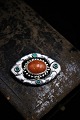 Fine, old Art Nouveau brooch in silver decorated with 1 large and 4 small stones. 5x3.5cm.