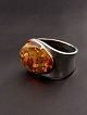 Sterling silver bangle with amber 4.5 x 4.1 cm. subject no. 516796