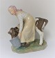 Royal Copenhagen. Porcelain figure. Girl with cow in colors. Model 779. Height 16 cm. (1 quality).