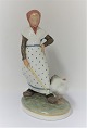 Royal Copenhagen. Porcelain figure. Goose girl in colors. Model 528. Height 18.5 cm. (1 quality)