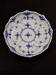 Royal 
Copenhagen blue 
fluted 
half-lace bowl 
on foot. 1/511 
1.sorting 
subject no. 
517186