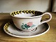 Large ceramic morning cup with saucer from Lars Syberg ceramics. Decorated with flowers. The cup ...