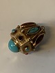 Gold pendant with turquoise in 18 carat goldStamped 750Height 30.56 mm approxchecked by ...