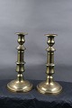English pair of candlesticks on round stand of brass from about year 1880. They are in a good ...