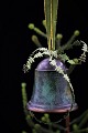 Old Christmas bell in metal with green color and fine green velor ribbon for hanging. H: 9cm. ...
